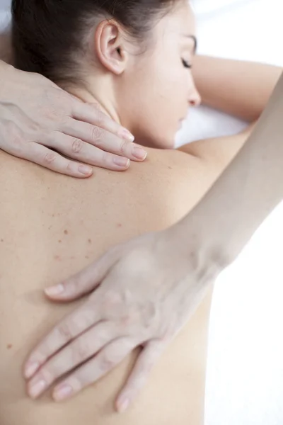 Beautiful woman in spa salon getting massage — Stock Photo, Image