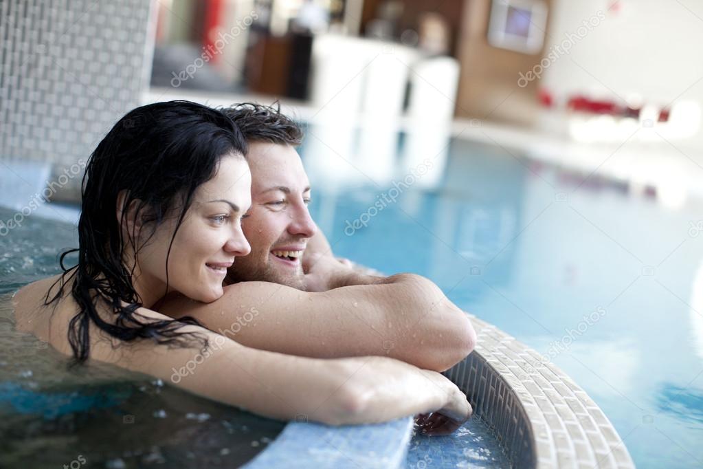 Couple relaxing in jacuzzi