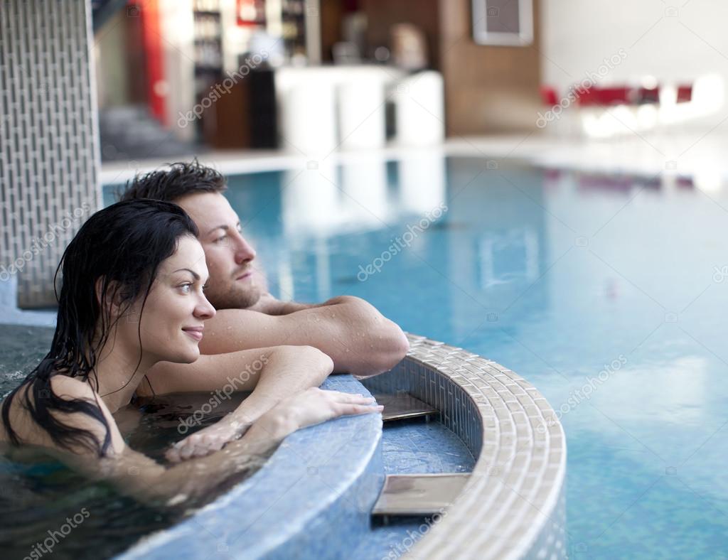 Couple relaxing in jacuzzi