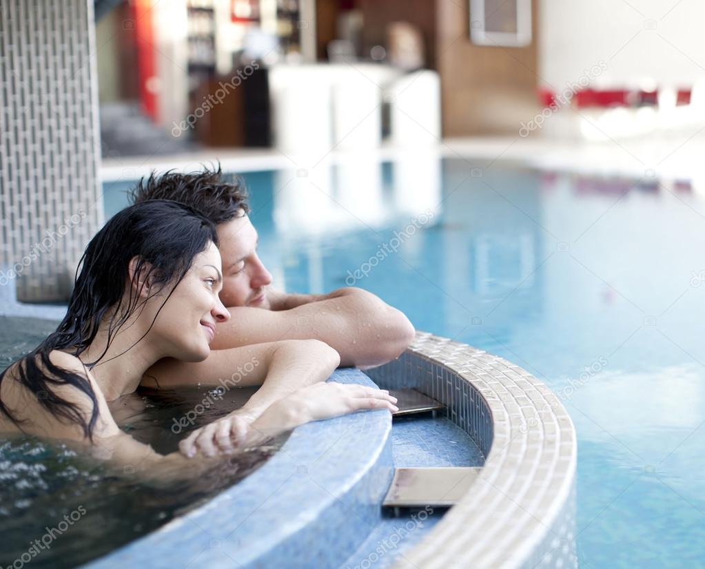 Couple relaxing in jacuzzi