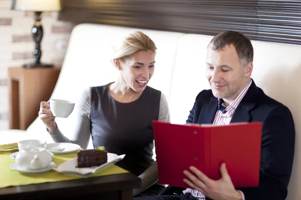 Working colleagues - a man and a woman — Stock Photo, Image