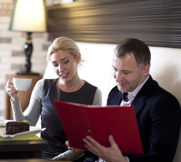 Working colleagues - a man and a woman — Stock Photo, Image