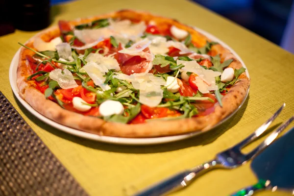 Tasty pizza on table — Stock Photo, Image