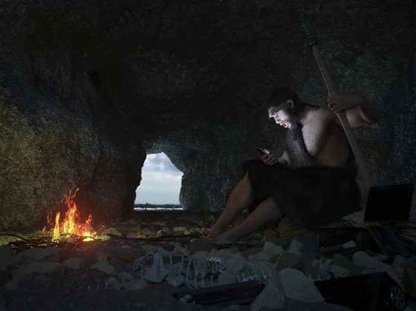 Primitive man siting in the cave with smartphone concept illustration — Stock Photo, Image