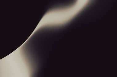 Sıcak şampanya, bronz ve parlak nötr altın tonlarıyla tanımlanmış zarif metalik bir arkaplan. Yumuşak bulanık ve akışkan hareket yumuşak bir derinlik ve parlak bir görsel doku ekler..