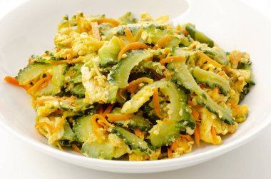 Goya Chanpuru domuz eti ve yumurtayla kızartılmış acı kavundur. Goya Chanpuru, Okinawa 'nın yerel yiyeceği olarak bilinir ve şimdi tüm Japonya' da insanlar tarafından yenir..