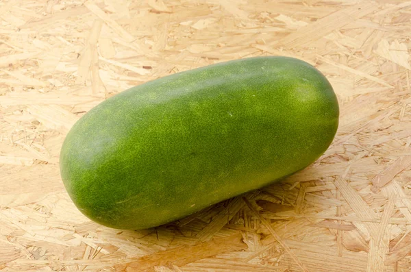 Melón Invierno Sobre Madera Contrachapada Fondo Del Tablero —  Fotos de Stock