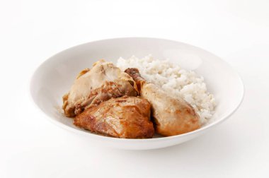 Pearl Barley 'li sarımsaklı tavuk. Bir tabak sade sarımsaklı tavuk ve inci arpa pilavı..