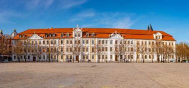 Panoramic view over major square with fountains in Magdeburg by Cathedral and Government Office, at sunny day and blue sky clipart