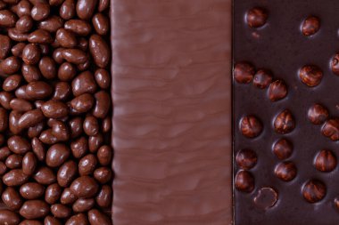 Çikolata ve çikolata kaplı fıstıklar. Fındıklı çikolata. Kalıplı çikolata..