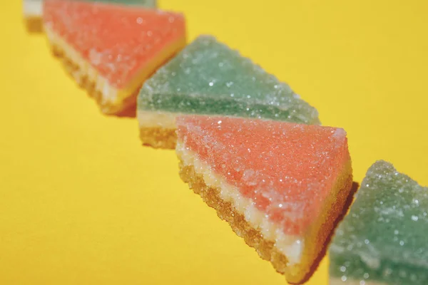 Colorful Triangular Jelly Candy Yellow Background Macro Shot — Stock Photo, Image