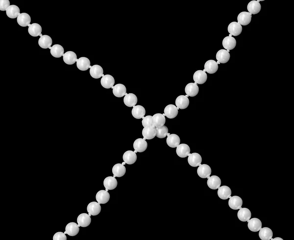 Kříž umělé perel — Stock fotografie