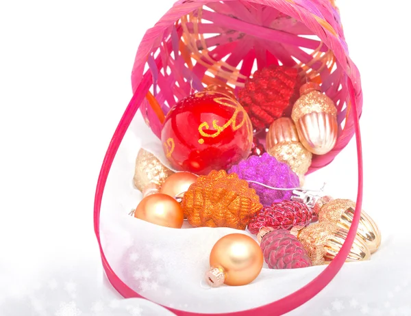Christmas decorations spilled from basket — Stock Photo, Image
