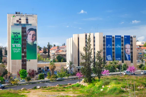 Rival parties billboards on the buildings along a highway road i — Stock Photo, Image