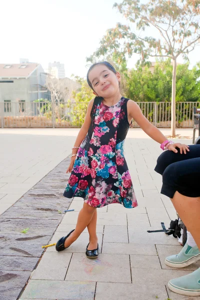 Cute little girl making faces — Stock Photo, Image