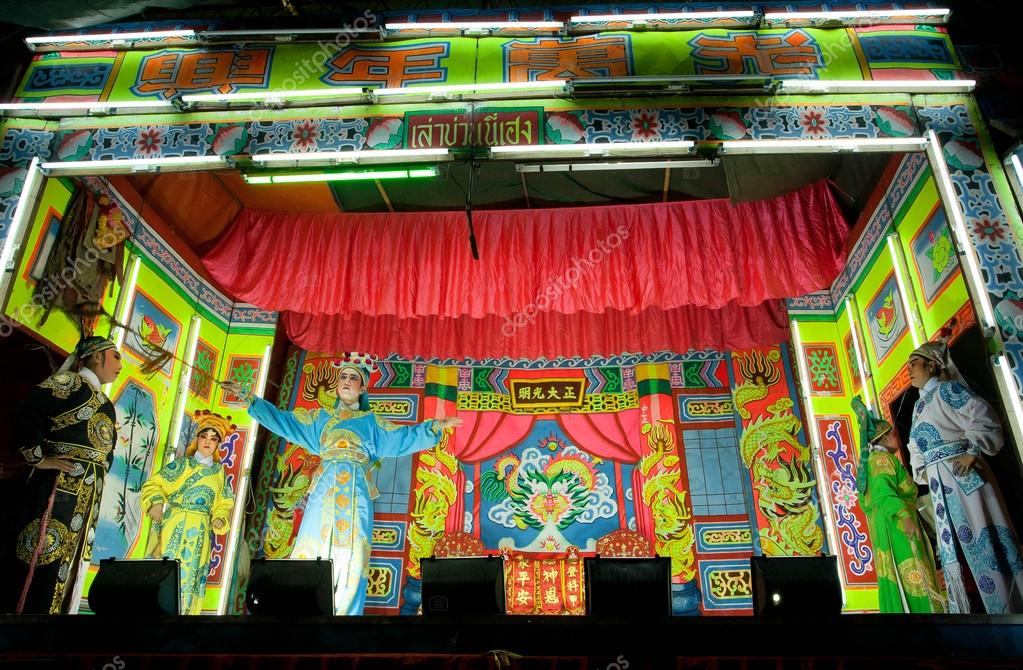 Performance of the chinese opera actors on the stage of small art