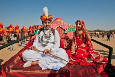 Beautiful young couple in national clothes