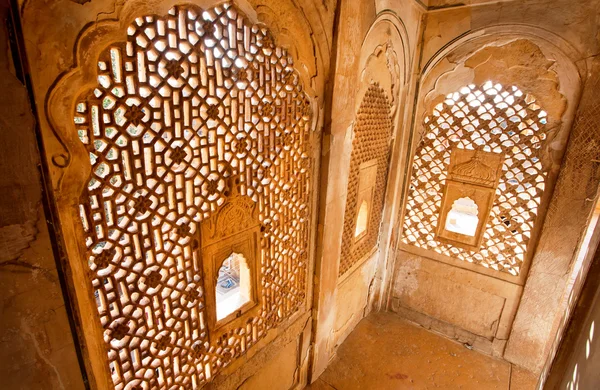 Carved ornaments on a stone wall surface — Stock Fotó