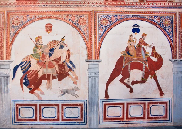 Horse and camel riders on the fresco of historical mansion — Stock Photo, Image