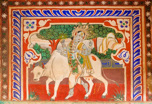 El Señor Krishna caminando con vaca santa en el campo al fresco — Foto de Stock
