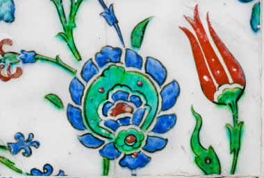 Tulips on the vintage tiles in Turkey