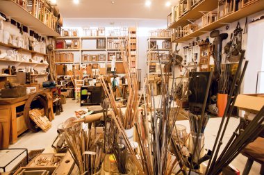 Craftsman's loft with artistic tools, frames and paints