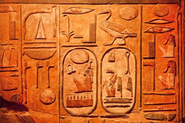 Stone artifact from ancient Egypt - wall with signs and Egyptian hieroglyphs