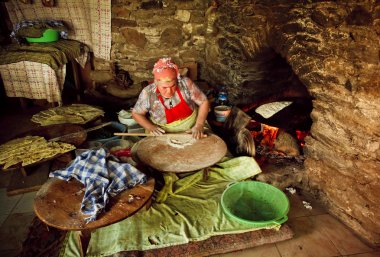 Traditional tableside preparation of Gozleme turkish meal in a village restaurant