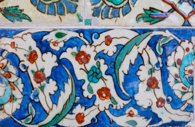 Ceramic tiles with flowers on designed wall of famous historical Topkapi palace, Istanbul.