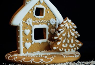 Gingerbread house and tree form homemade cookies for children fun