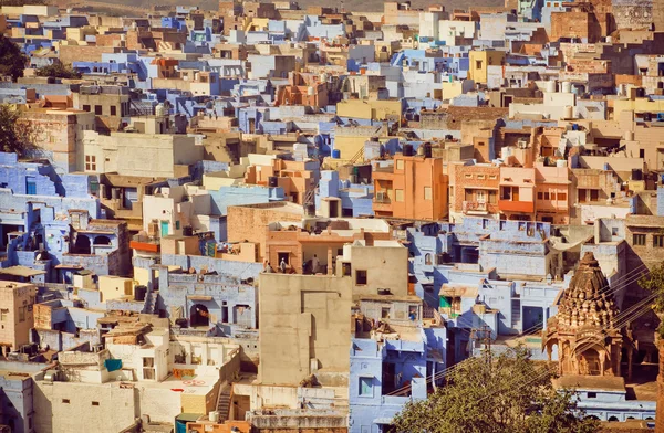 Yellow color and blue concrete constructions of historical city in India — ストック写真