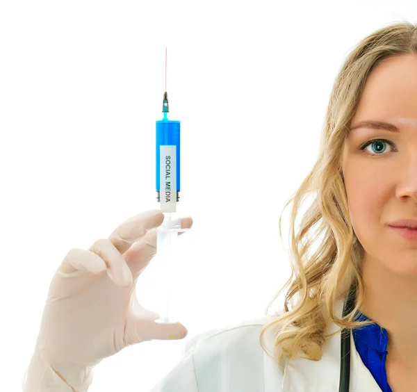 Female doctor with syringe. Social media addiction concept. — Stock Photo, Image