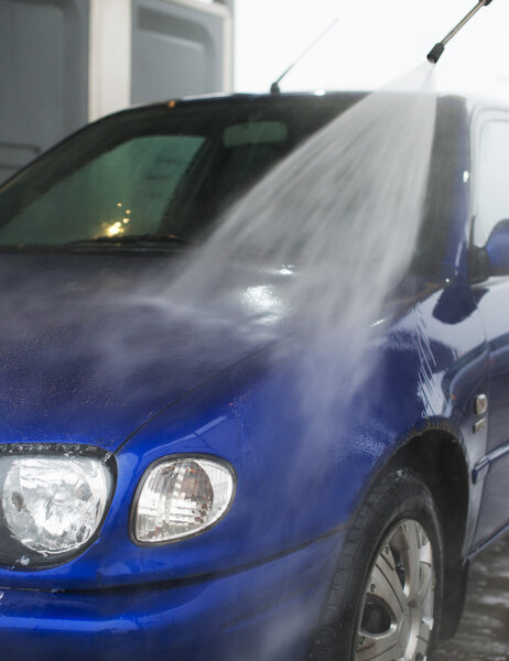 Car wash using high pressure water jet.