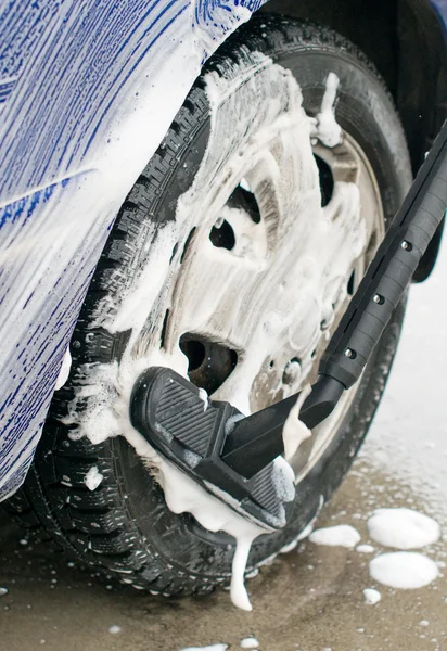 Car wash using special brush with soap. — Stock Photo, Image