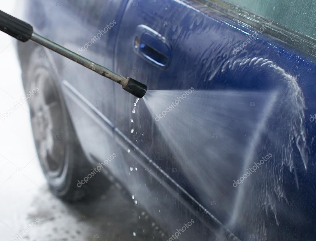 Car wash using high pressure water jet. — Stock Photo © dmitrimaruta #105448072