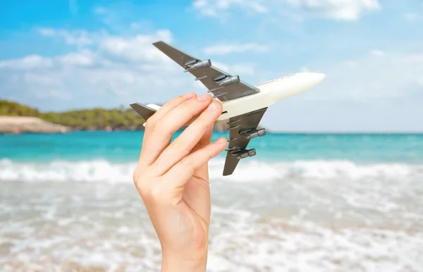 Child hand holding model airplane. Place for text. — Stock Photo, Image