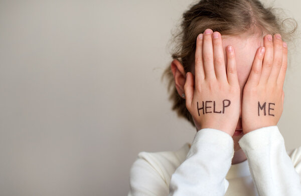 Child need help. Little girl crying. Place for your text.