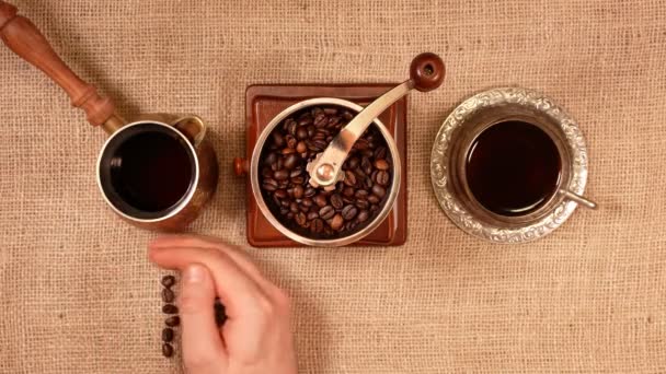 Coffee beans arranged in letters Coffee in russian. — Stock Video