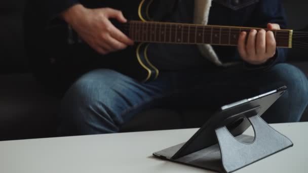 Man Learns How Play Guitar Remote Online Lesson — Stock Video