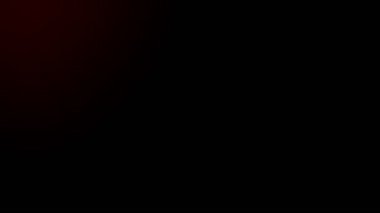 Kırmızı ışık arka planda sızıntı yapıyor. 4K 'da gerçek atış..