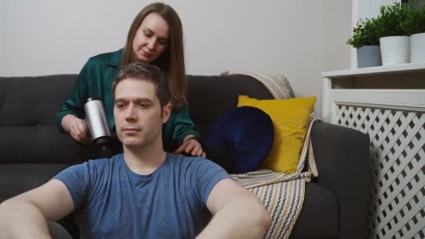 Woman Massaging Man Massage Percussion Device Home — Stock Video