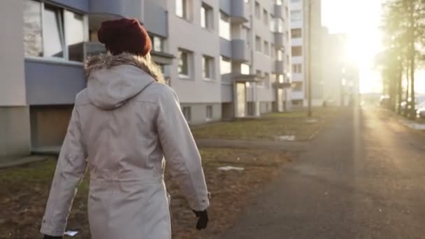 Woman Coat Walks Sunny Spring Day — Stock Video