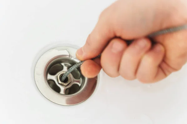 Plumber Using Drain Snake Unclog Bathtub — Stock Photo, Image