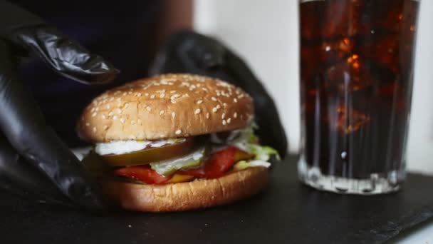 Woman Black Gloves Taking Hamburger — Stock Video