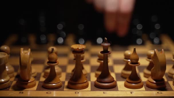 Person Uses Pawn Board Chess Game — Stock Video