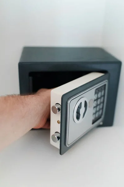 Man Hand Taking Something Small Safe — 스톡 사진