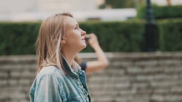 Woman Denim Jacket Walks City — Stock Video