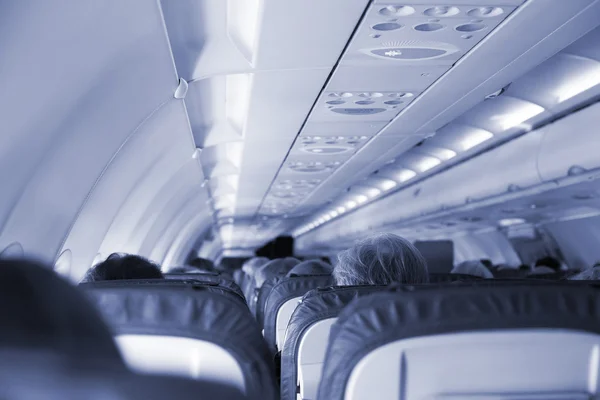 Interior inside of the plane with passengers. — Stock Photo, Image