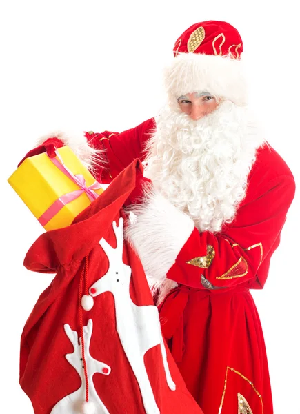 Santa with bag of presents. Isolated on white. — Stock Photo, Image