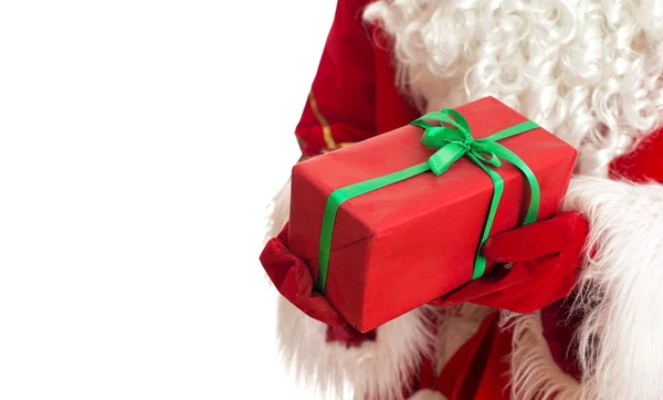 Papá Noel tiene un regalo. Aislado sobre blanco. Lugar para su texto . —  Fotos de Stock